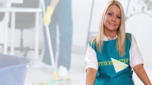 Friendly female cleaner in ServiceMaster Clean uniform